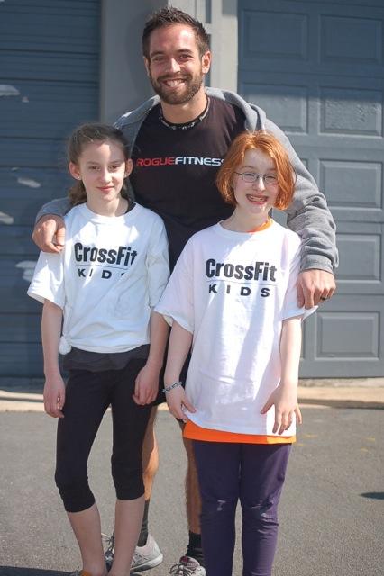While Buds and I were out in The Valley, Monkey and Friend were getting their picture taken with the Rich Froning, The Two-Time Fittest Man In The World, or "Chris' CrossFit Idol."