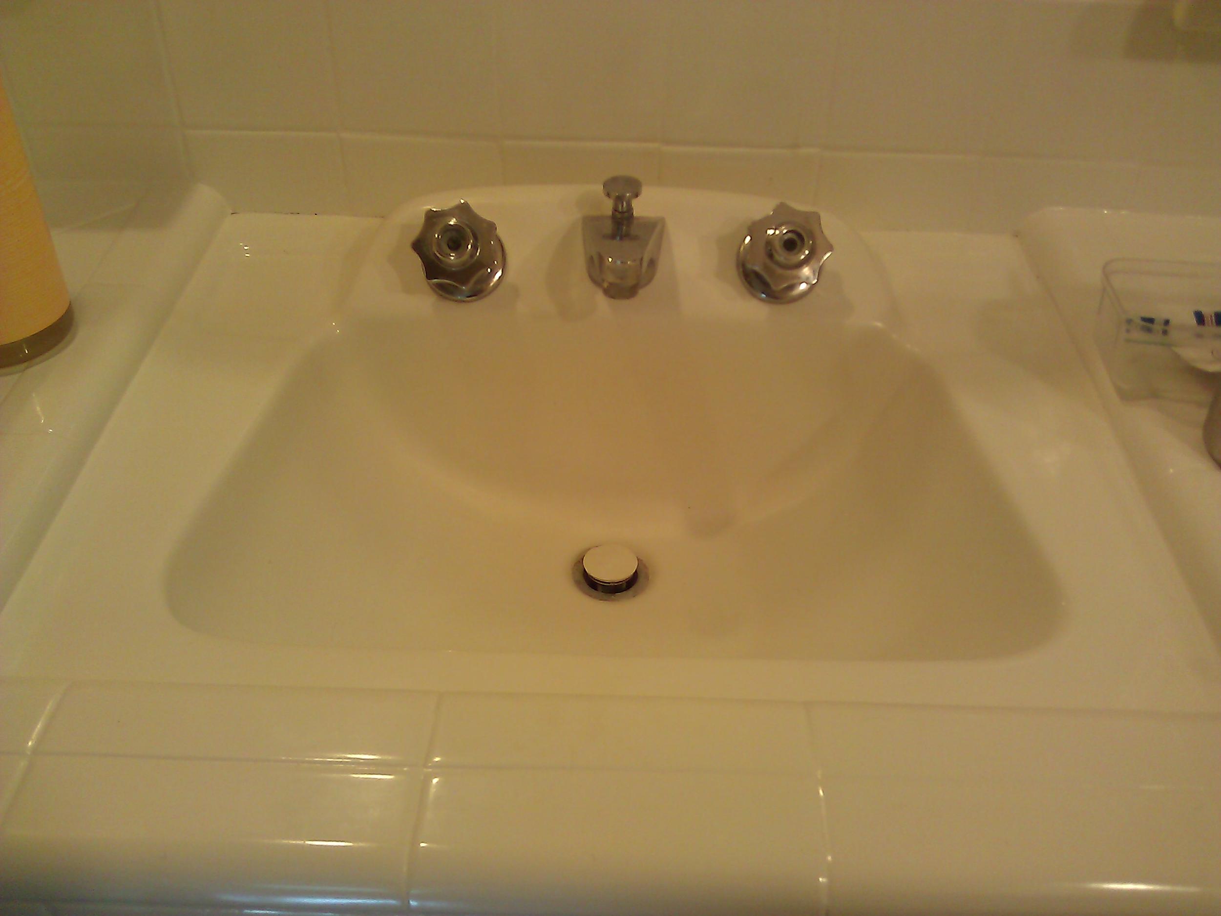 The sink I adore, but Buds doesn't care for as much. It reminds me of a sink you would find in an old train station. Buds did not find this to be a positive.