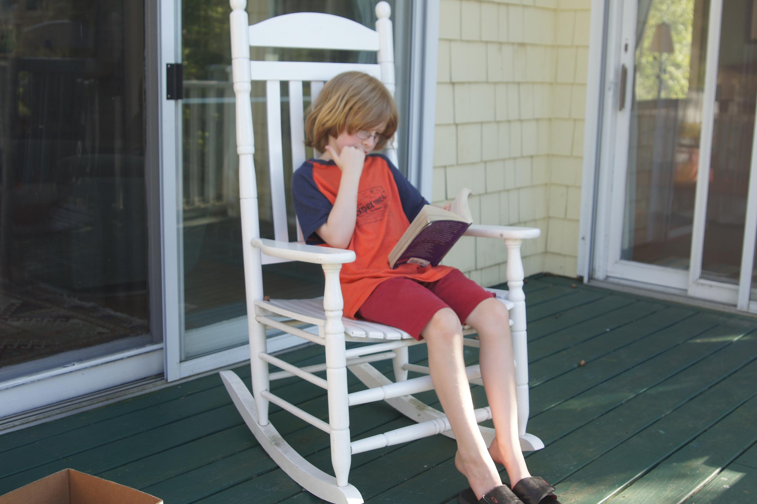 Boy on a porch