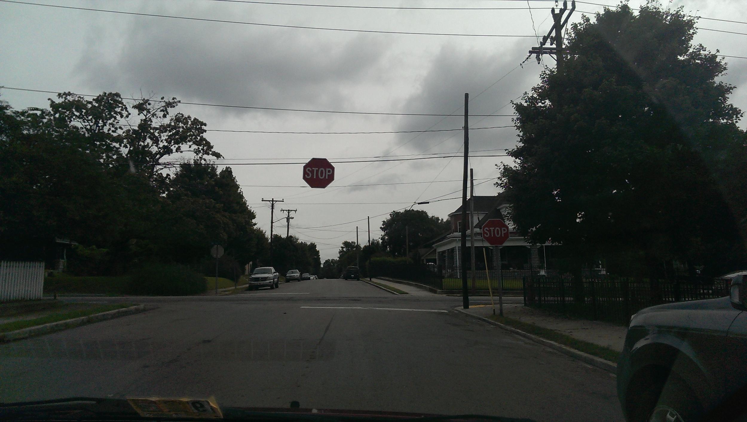 In hipster neighborhoods, the stop signs are trying to float away.