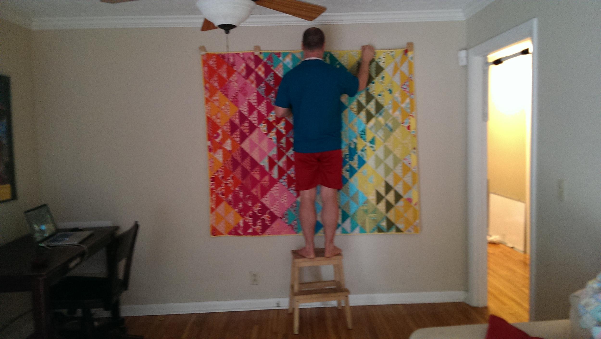 We hung our new quilt, made by the Amazing April.
