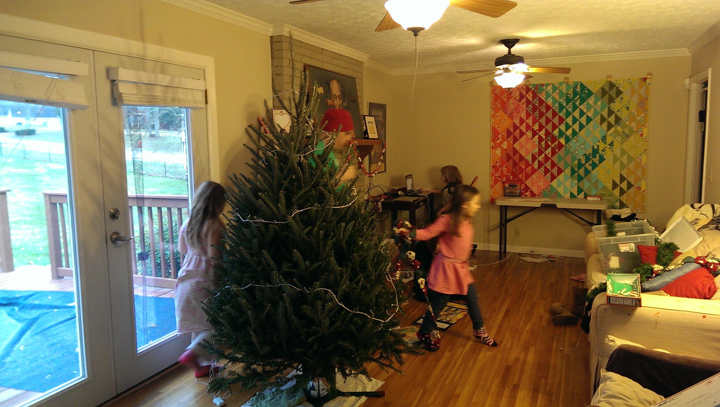 The tree goes up!