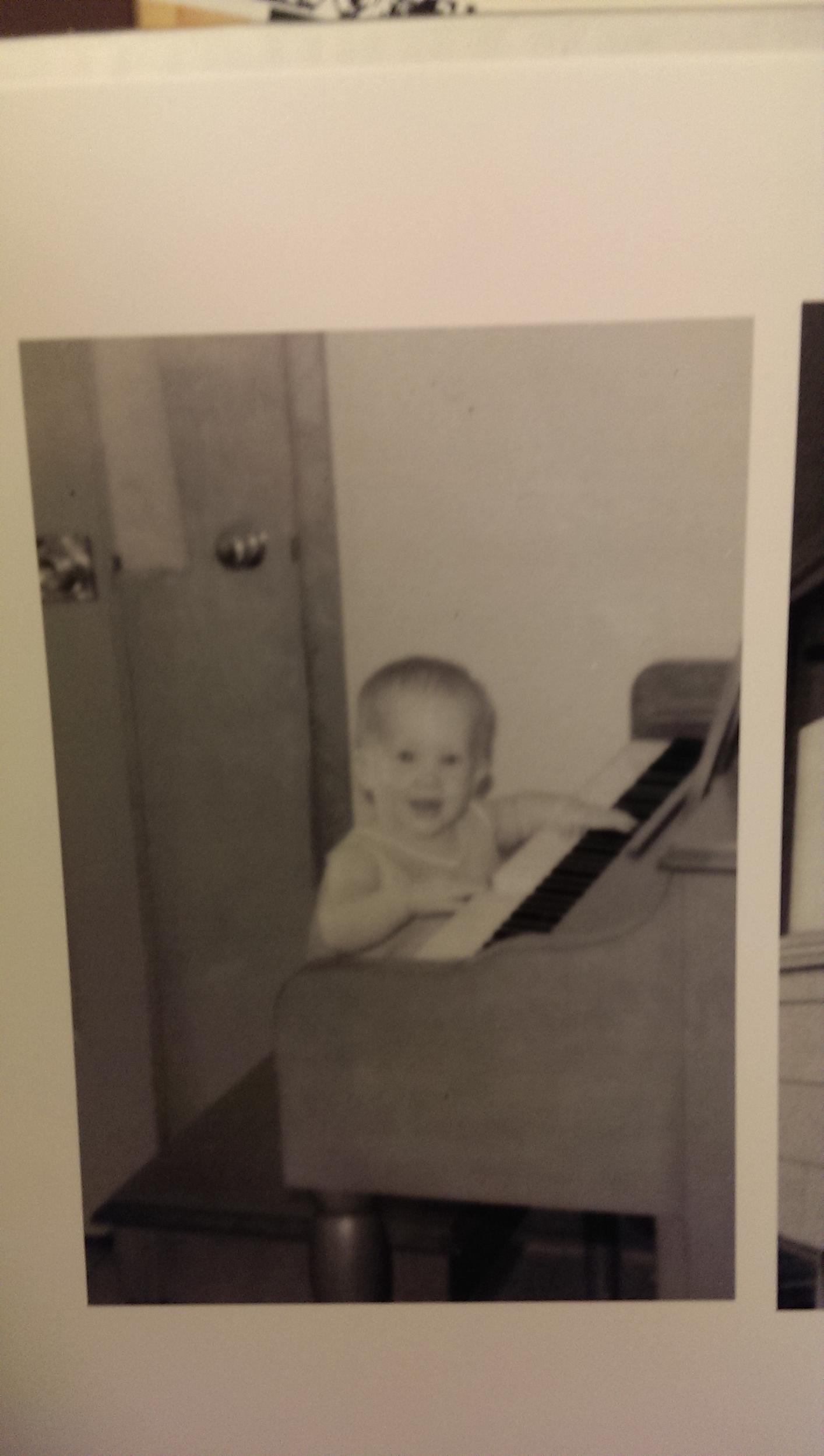 Cute, sweet baby Jennie, playing the piano.