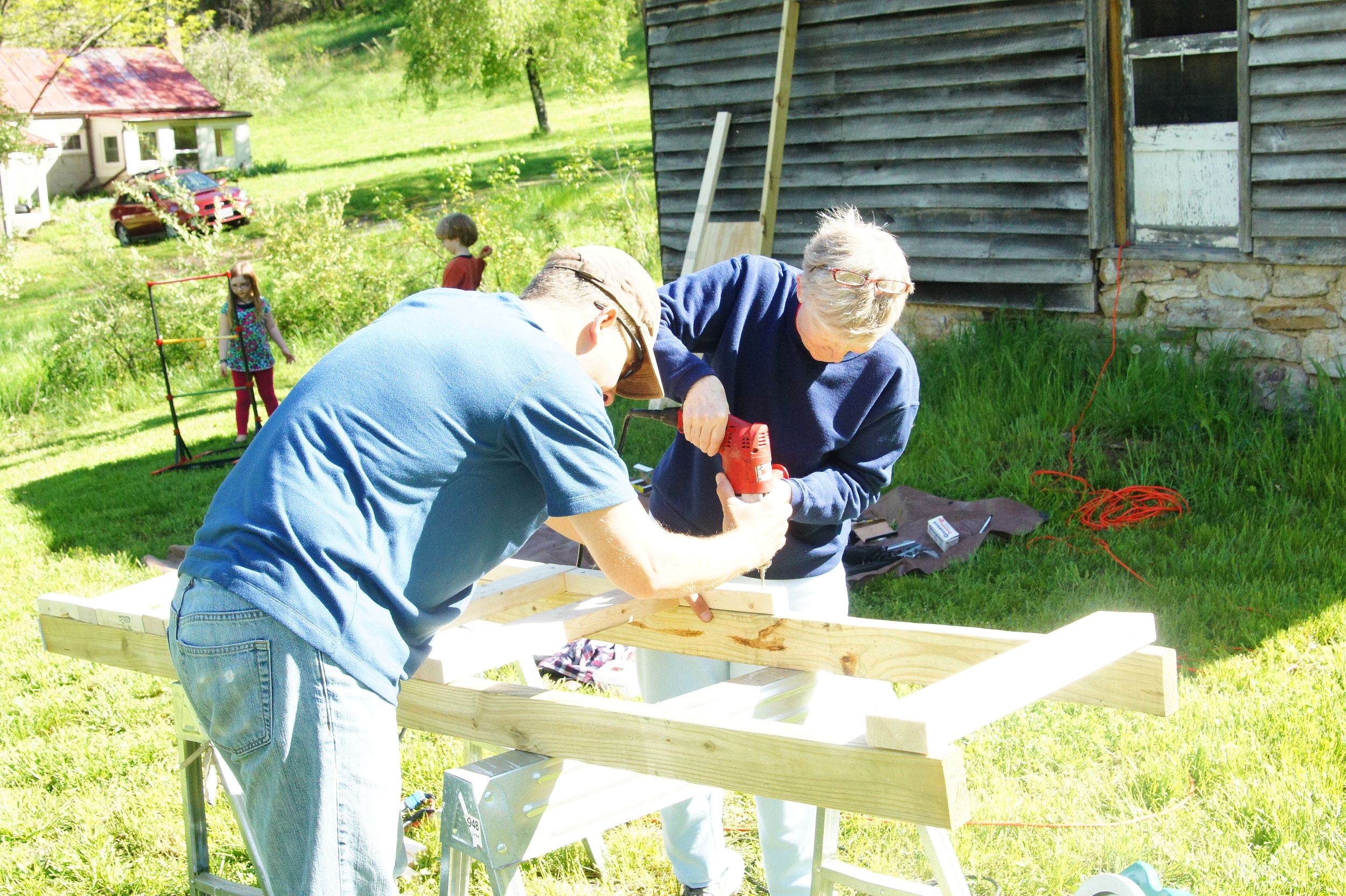 Babs helping build the treehouse at Massadoah.