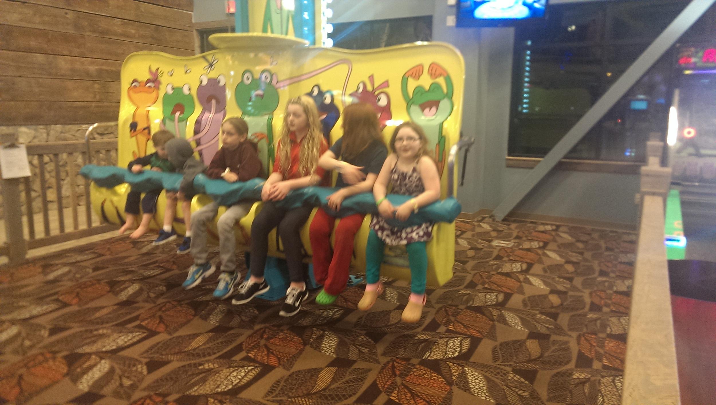 Monkey, Yessa, and Katherine getting ready to ride the "Baby Tower of Terror."