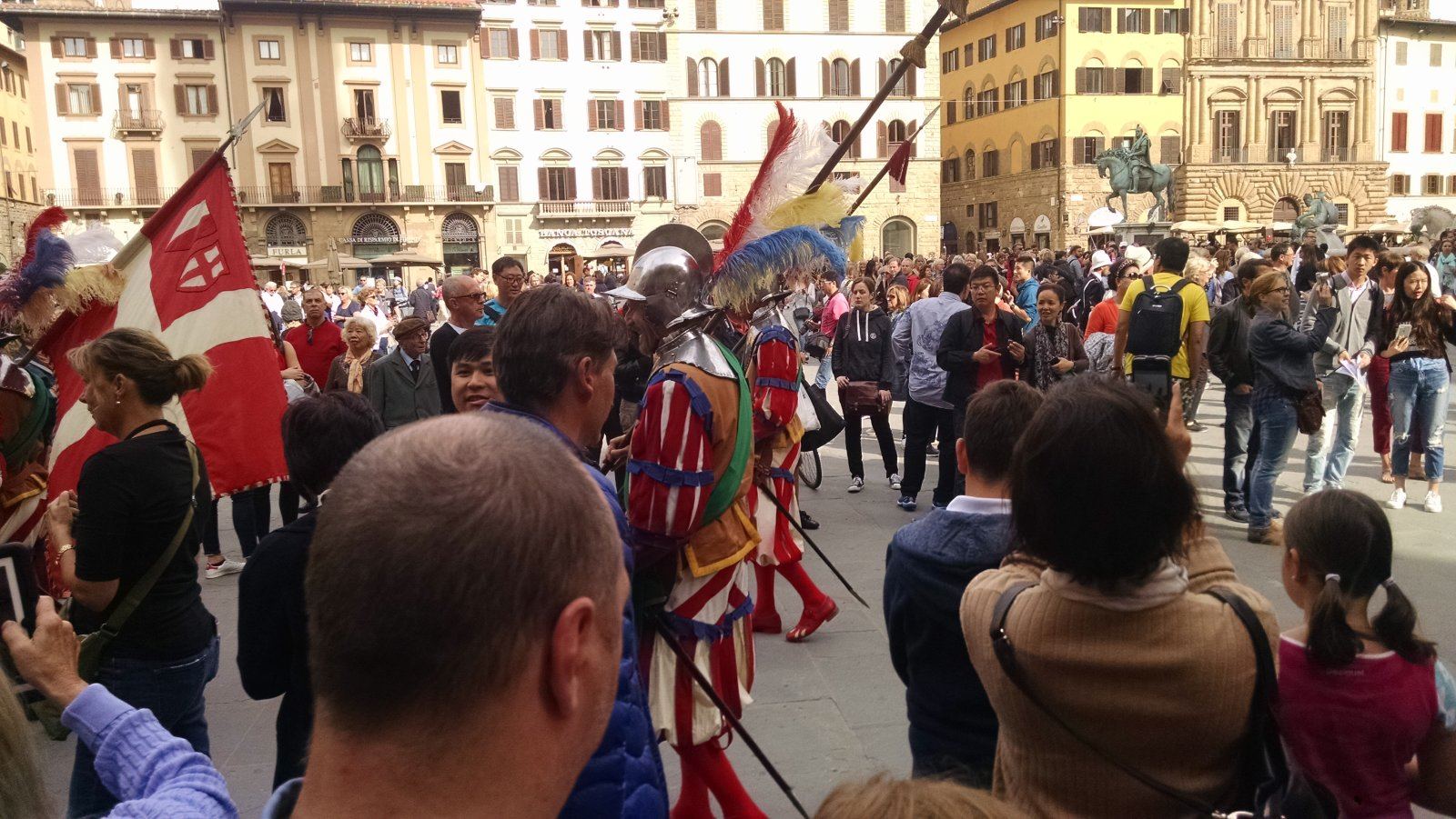 The ceremony taking place by the statue area near the Uffizi.