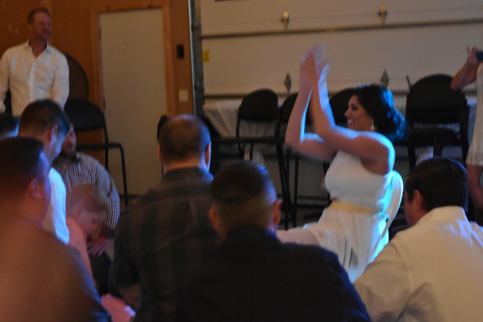 Singing a romantic song to the bride. Even Buddie's back looks uncomfortable. 