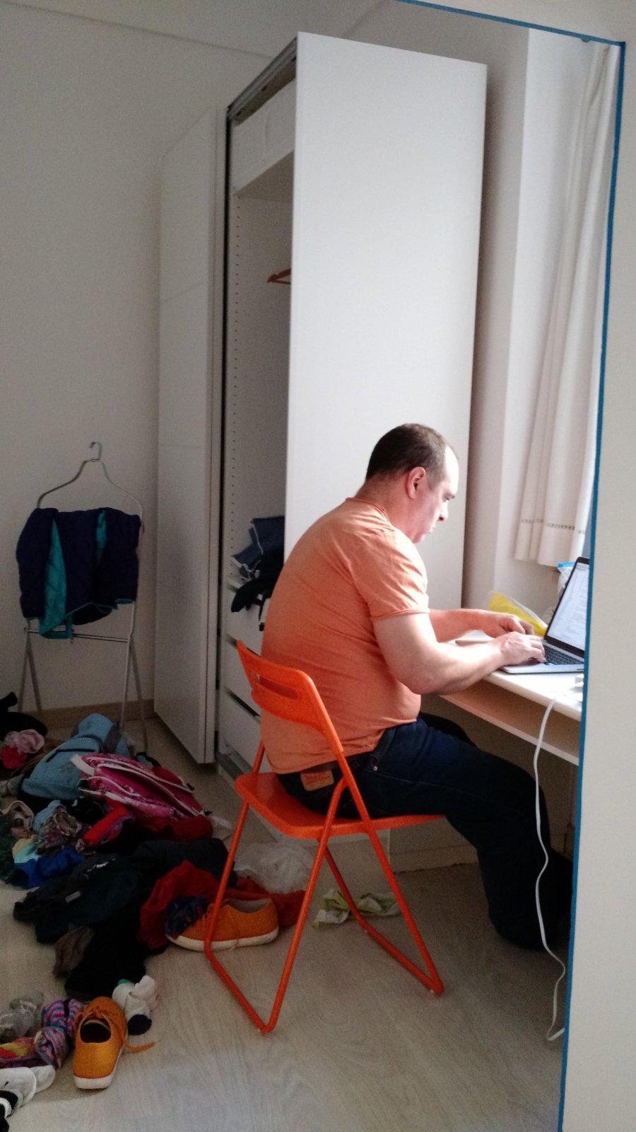 He matched his shirt to his chair, which I'm sure helped his productivity.
