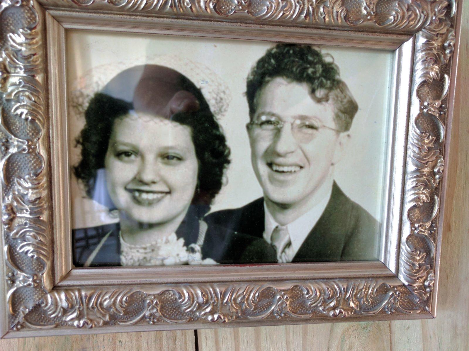 My brothers' first mom and our dad. Love Dad's curly hair.