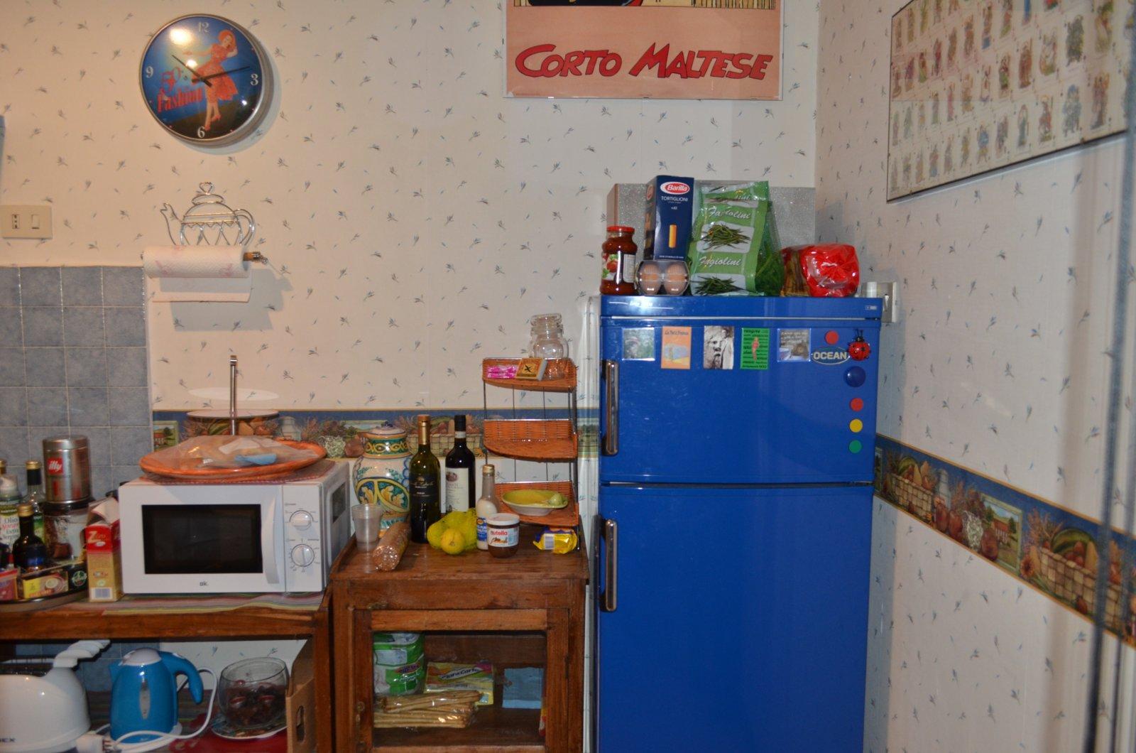 Grandma likes a cluttered kitchen.