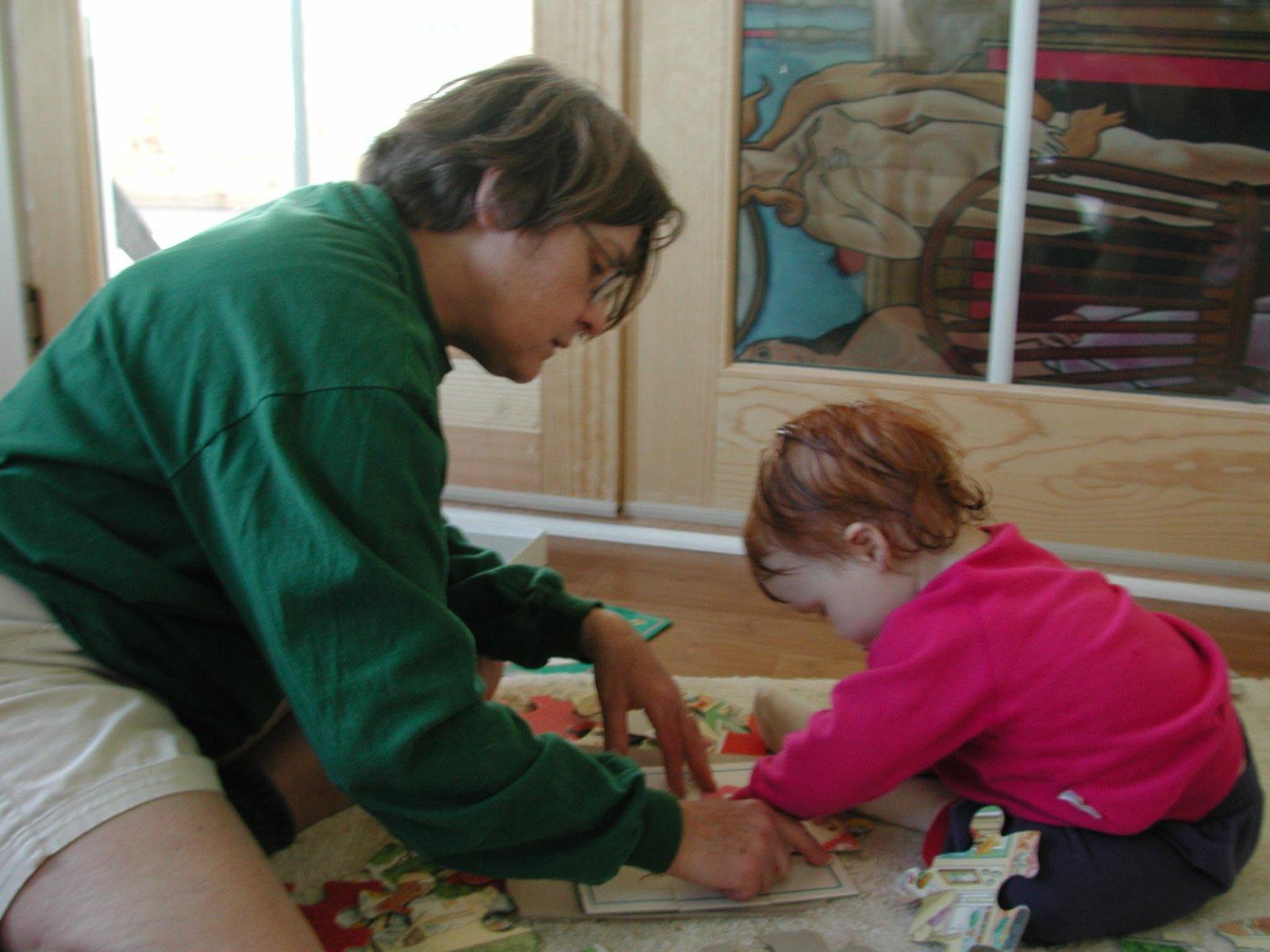 Monkey and Nonni playing next to the bookcase on what ended up being the night before Buster was born in this house. 