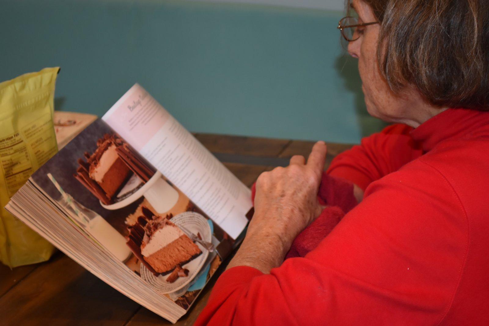 Nonni reading up on the recipes.