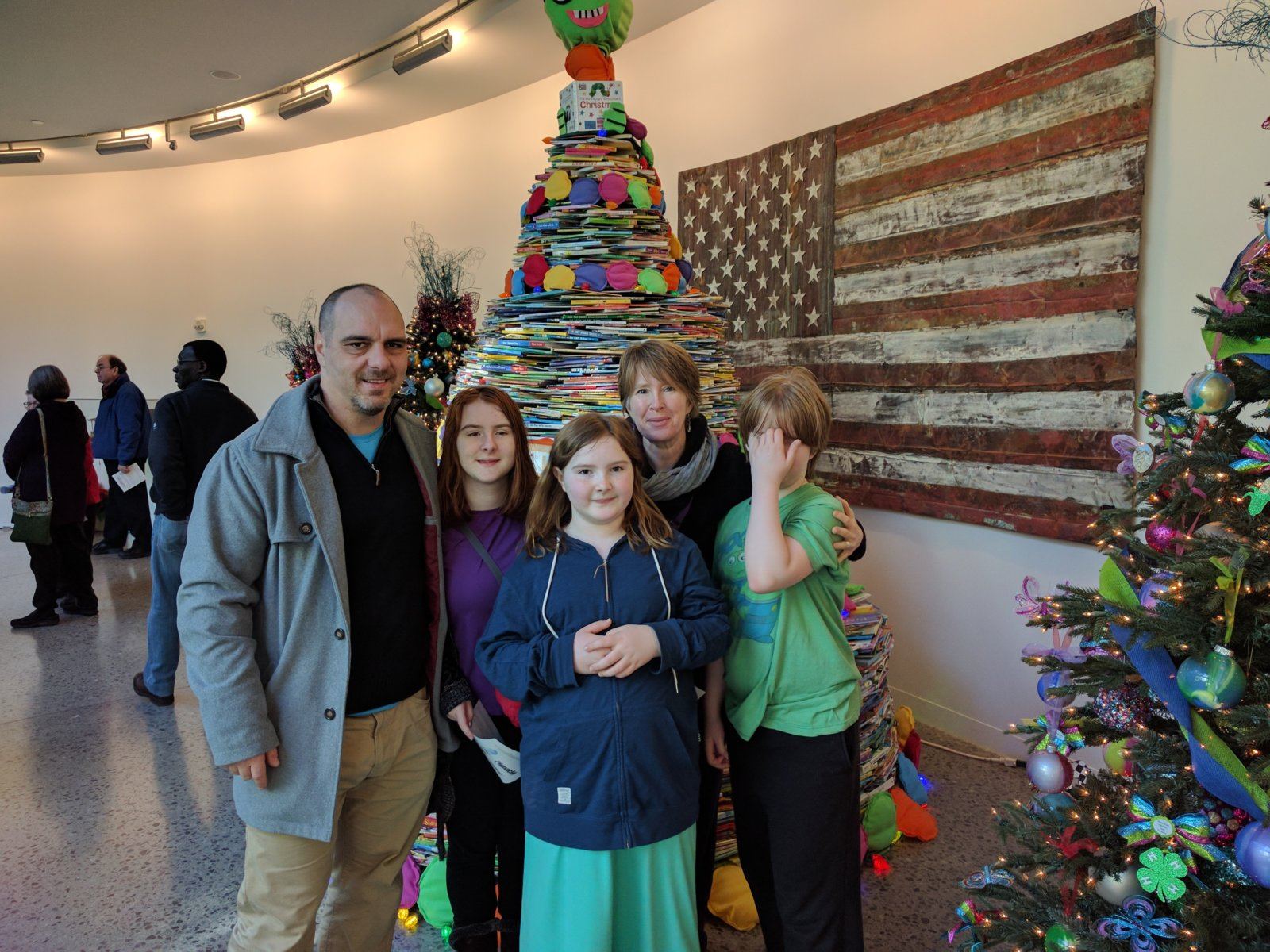 The book tree behind us is a Guinness record attempt for the tree made with the most books. Over 13K.