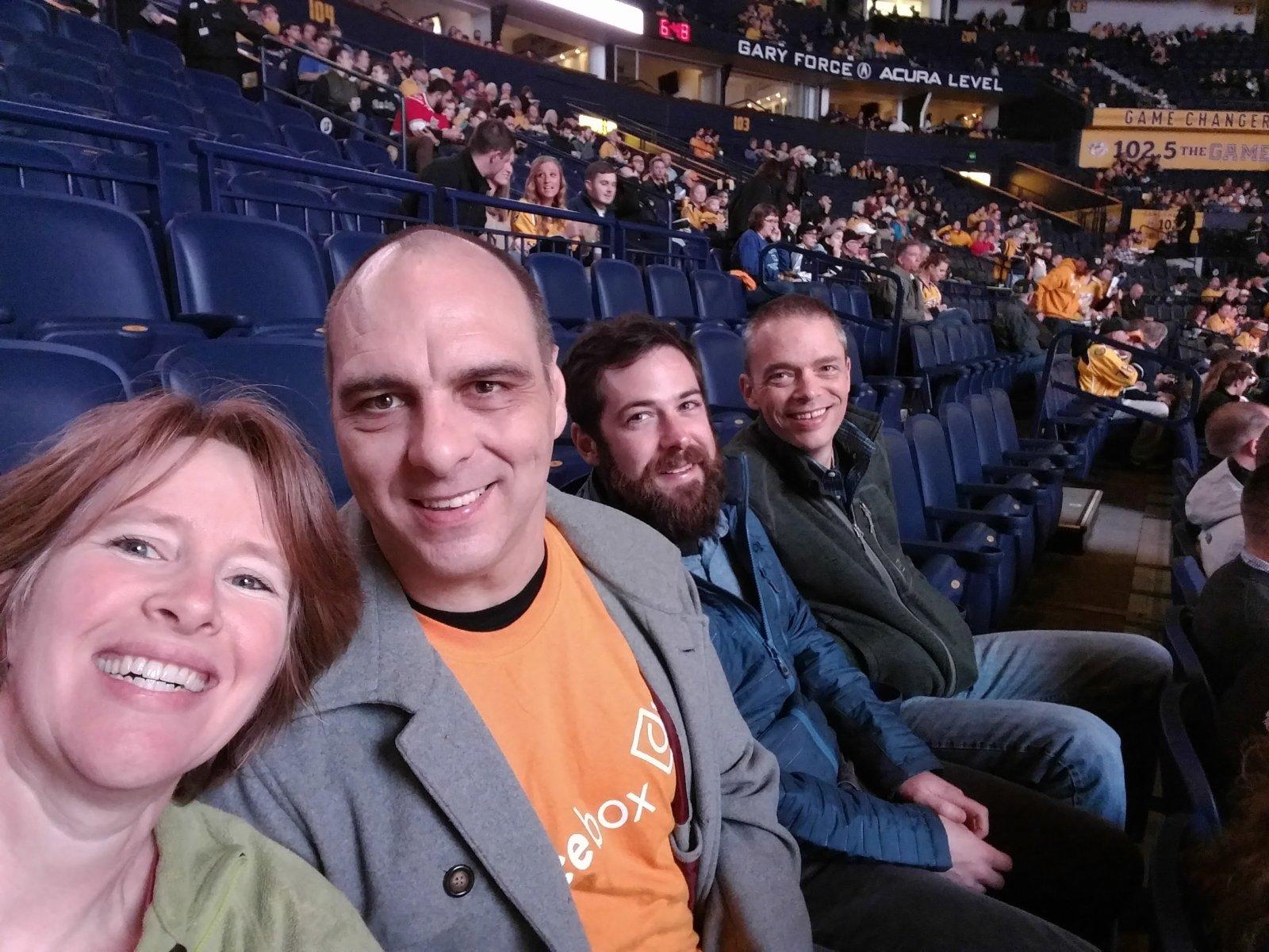 A hockey date night with Buds and his co-workers.